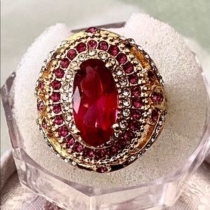 Red Sapphire in 18 CT gold plated over silver.